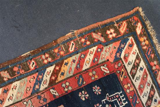 A Shirvan blue ground runner, c.1900, 15ft 6in by 3ft 7in.
